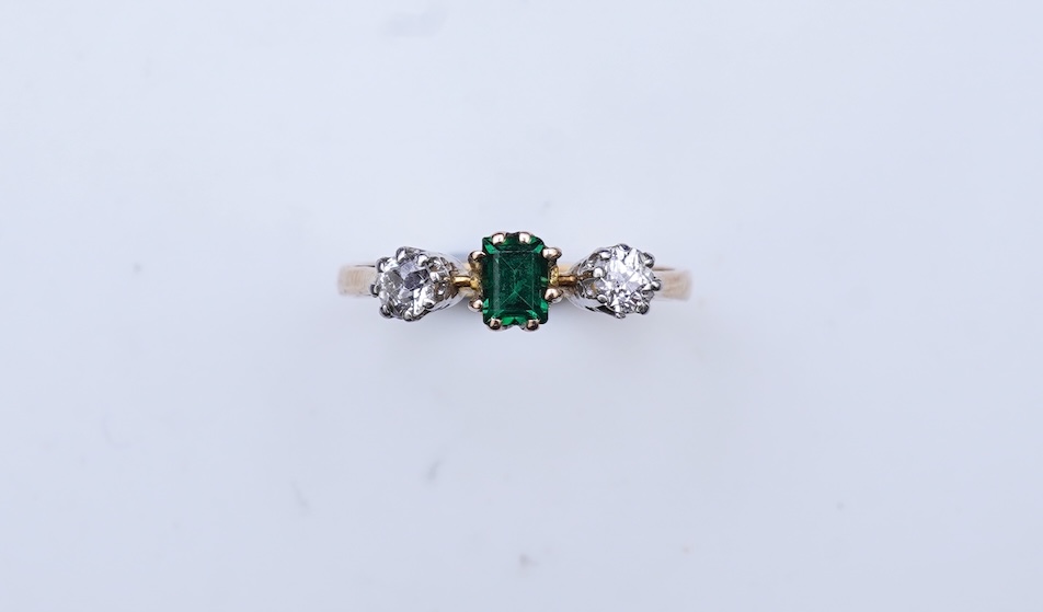 A tsavorite and diamond ring